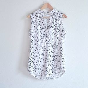 Spotted blouse black and white.